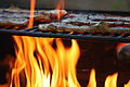 Meat fillets being grilled.jpg