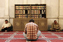 Muslim men reading the Quran Men reading the Koran in Umayyad Mosque, Damascus, Syria.jpg