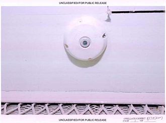 Thomas acknowledged he had known that devices made to look like smoke detectors were actually listening devices, installed so intelligence analysts could eavesdrop on Guantanamo detainees and their lawyers. Microphone masquerading as a smoke detector, at Guantanamo.jpg