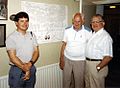 Korn's son Roy & grandson Michael examine family tree at Swedish home of her brother Axel in 1993