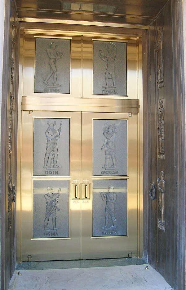 Monumental Glass Doors at Library of Congress John Adams Building, installed in 2013 in part to protect the original bronze doors, which they mimic in