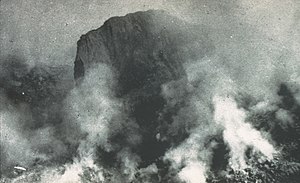 The lava spine which emerged from the lava dome reached 150 m (490 ft) on 19 August 1951 Mount Lamington lava spine.jpg