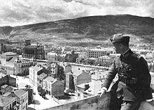 A Bulgarian officer looking at Skopje's centre, April 1941 Nanev Skopje 1941.jpg