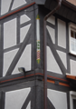 English: Half-timbered building (detail) in Nidda, OberSchmitten Alter Weg 9, Hesse, Germany This is a picture of the Hessian Kulturdenkmal (cultural monument) with the ID Unknown? (Wikidata)