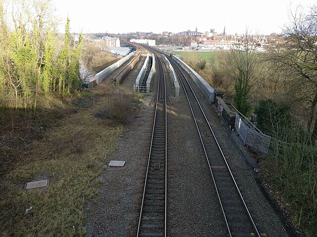 North Wales Coast Line between Chester and Saltney, showing the two tracks over the River Dee. The path of the other two tracks which were removed can