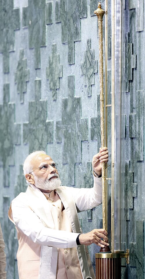 Indian Prime Minister Narendra Modi installing the Sengol sceptre in the new Indian Parliament