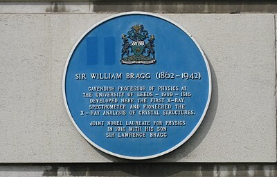 Institute of Physics plaque on the Parkinson Building, University of Leeds, recording the work carried out there by Sir William Henry Bragg