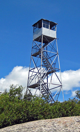 The 1917 fire tower Poke-O-Moonshine Mountain fire tower.jpg