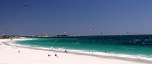 Bathers and kite surfers at Port Beach