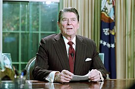 President Ronald Reagan during his address to the Nation on Iran Contra Controversy in the Oval Office.jpg