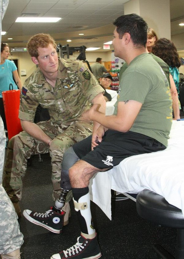 Harry (left) talking to an injured soldier at the Walter Reed National Military Medical Center, Bethesda, Maryland, US; 15 May 2013