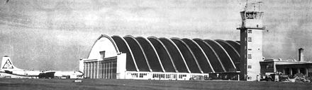 Rapid City Air Force Base B-36 hangar. A B-36 bears the SAC tail code Triangle-S of the 28th Bomb Wing. SAC eliminated tail codes in 1953.