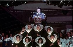 Rock Hudson narrating at Magic Kingdom as the star of "the living christmas tree". Rock Hudson Candlelight.jpg