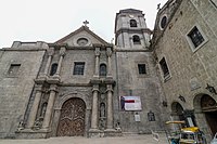 San Agustin Church and its remaining standing bell tower (the on the left was destroyed by an earthquake) (17106345010).jpg