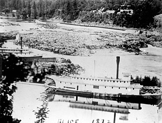 Steamers Alice, center, and Albany at left, in drydock, circa 1874. Across the falls can be seen the new ship canal, built by the P.T. Company's competitor, the Willamette Falls Canal and Locks Company. Steamers Alice and Albany at Oregon City circa 1874 image 2.jpg