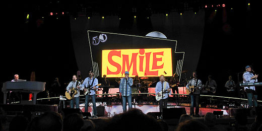 Wilson and members of his band performing "Heroes and Villains" with the Beach Boys in 2012, during their reunion tour