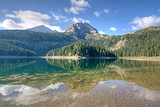 Black Lake in Durmitor National Park, which is a UNESCO World Heritage Site The Black Lake in Montenegro.jpg