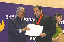 Vikram receiving the National film award from A.P.J. Abdul Kalam for his performance in Pithamagan in 2005. The President Dr. A.P.J. Abdul Kalam presenting the Best Film Actor Award for the year 2003 to Shri Vikram for his role in " Pithamagan" at the 51st National Film Award function in New Delhi on February 2, 2005..jpg