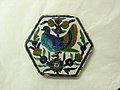 Hexagonal tile with blue bird and flowers