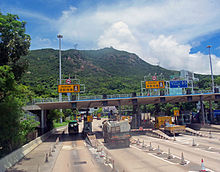 Toll booths at the approach to the Aberdeen Tunnel in Hong Kong Toll booth at south portal of Aberdeen Tunnel, Hong Kong.jpg