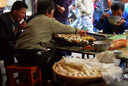 Enjoying street food in Yuanyang