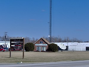 The original studio-office building and transmitter tower of WYAN, today used by WXML, a non-profit Christian radio station, on the outskirts of Upper Sandusky. WXML purchased this site after WYAN had fallen silent and its assets liquidated. WYAN would return to the air as WYNT at a site about a mile west of this site later. WXML-WYNT.jpg