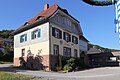 * Nomination Waldaschaff, Am Muehlbach 5, town hall, 1907 --KaiBorgeest 23:04, 16 November 2023 (UTC) * Decline  Oppose The lighting isn't hitting the main facade of the building, the wreath in upper right corner is distracting, and the image seems to have some perspective warp --Jay.Jarosz 03:13, 17 November 2023 (UTC)