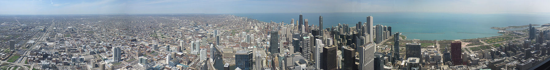 View of Chicago greater metropolitan region and the dense downtown area from the Willis Tower