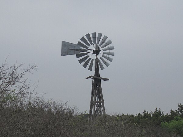 Lone wooden windmill in eastern Edwards County