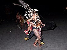 A Dayak man performing the Tarian Ngajat (Ngajat Dance) YanAriefTarianNgajat.jpg