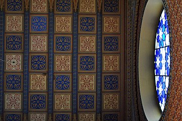 Ceramic ceiling decoration and stained glass of Rumbach Street synagogue