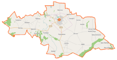 Mapa konturowa gminy Żuromin, blisko centrum u góry znajduje się punkt z opisem „Żuromin”