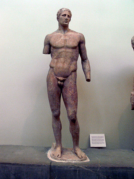 A statue of Agias, son of Acnonius, and winner of the pankration in three Panhellenic Games. This statue occupies Position III of the ex voto of Daochos. Height: 2 metres (6 feet 7 inches)
