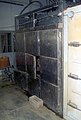 A morgue where the decomposing bodies of dead soldiers lay in lockers just outside of a hospital in Ar Rustamiyah, Iraq during Operation IRAQI FREEDOM - DPLA - 7ecca87ce554630ea4f02102da5fa2d9.jpeg