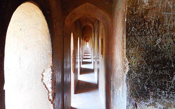 Bada Imambada is famous for its maze called 'Bhool Bhulaiyaa' in Hindi. It is built of identical 2.5 feet wide passageways like the one shown in this photograph. A true vanishing point.