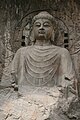 Ancient Buddhist Grottoes at Longmen- Fengxian Temple, Colossal Statue of Vairocana.jpg