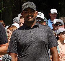 Anirban Lahiri looks on at the first tee box at the LIV Golf Invitational Boston at The International Golf Club in Bolton, MA. Anirban Lahiri LIV.jpg