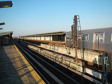 Platforms prior to renovation Av X NB train arriving jeh.jpg