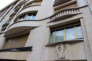 Art Nouveau influences – Sinuous curves on the façade of Avenue Montaigne no. 26, Paris, by Louis Duhayon and Marcel Julien (1937)[57]