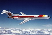 Iberia -200, air-to-air over clouds