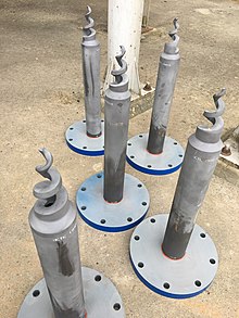 Multiple large spiral nozzles (also known as pigtail nozzles) used in a scrubber application. Spiral nozzles typically have the largest free passage design to help prevent clogging. BeteSprayNozzlesUsedInScrubberApplication.jpg