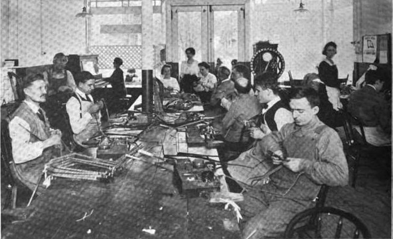 File:Blind workers taping armature coils.jpg