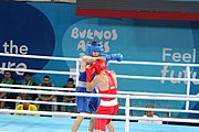 Deutsch: Boxen bei den Olympischen Jugendspielen 2018 Tag 12, 18. Oktober 2018 - Finale im Leichten Weltergewicht Jungen – Ilia Popov (Russland, rot) schlägt Talgat Shaiken (Kasachstan, blau) 4-1; Ringrichter ist James Beckles (Trinidad und Tobago). English: Boxing at the 2018 Summer Youth Olympics on 18 October 2018 – Final Light Welterweight Boys Bout - Ilia Popov (Rusia, rojo) supera a Talgat Shaiken (Kazajstán, azul) 4-1; Referee is James Beckles (Trinidad and Tobago). Español: Boxeo en los Juegos Olímpicos Juveniles de Verano de 2018 en 18 de octubre de 2018 - Chicos de peso welter ligero final: Ilia Popov (Uzbekistán, roja) le gana a Talgat Shaiken (Egipto, azul) 4-1; El árbitro es James Beckles (Trinidad y Tobago).