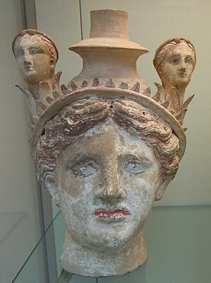 Female head incorporating a vase (lekythos), c. 325-300 BC.
