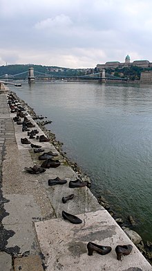 Holocaust Shoe Memorial beside the Danube River in Budapest. The shoes represent Hungarian Jews who lost their lives in January 1945. Budapest Hungary Holocaust Shoe Memorial Danube.jpg