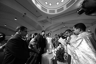 Priest reading the blessing at a Catholic wedding, 2018 Catholic wedding blessing.jpg