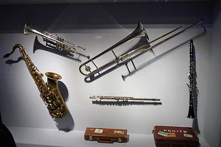 Chicago's Getzen trumpet, James Pankow's C.G.Conn Trombone, Clarence Clemons's H.Selmer Mark VI tenor sax, Ian Anderson's Artley flute, Patti Smith's H.Selmer Clarinet - Play It Loud. MET (2019-05-13 19.05.06 by Eden, Janine and Jim).jpg