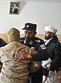 Col. Jilani Khan, the Zabul provincial deputy chief of police, thanks a member of coalition special operations forces for attending a meeting with elders and Afghan Uniform Police (AUP) district leaders at the 120201-N-CI175-043.jpg