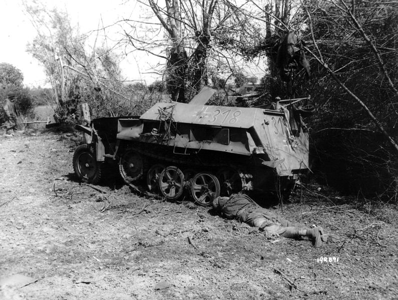 File:Deadsoldierandhalftrack.jpg