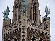 Detailed view of bronze statues at the top of the tower of the Georgian orthodox cathedral, Clapton, UK